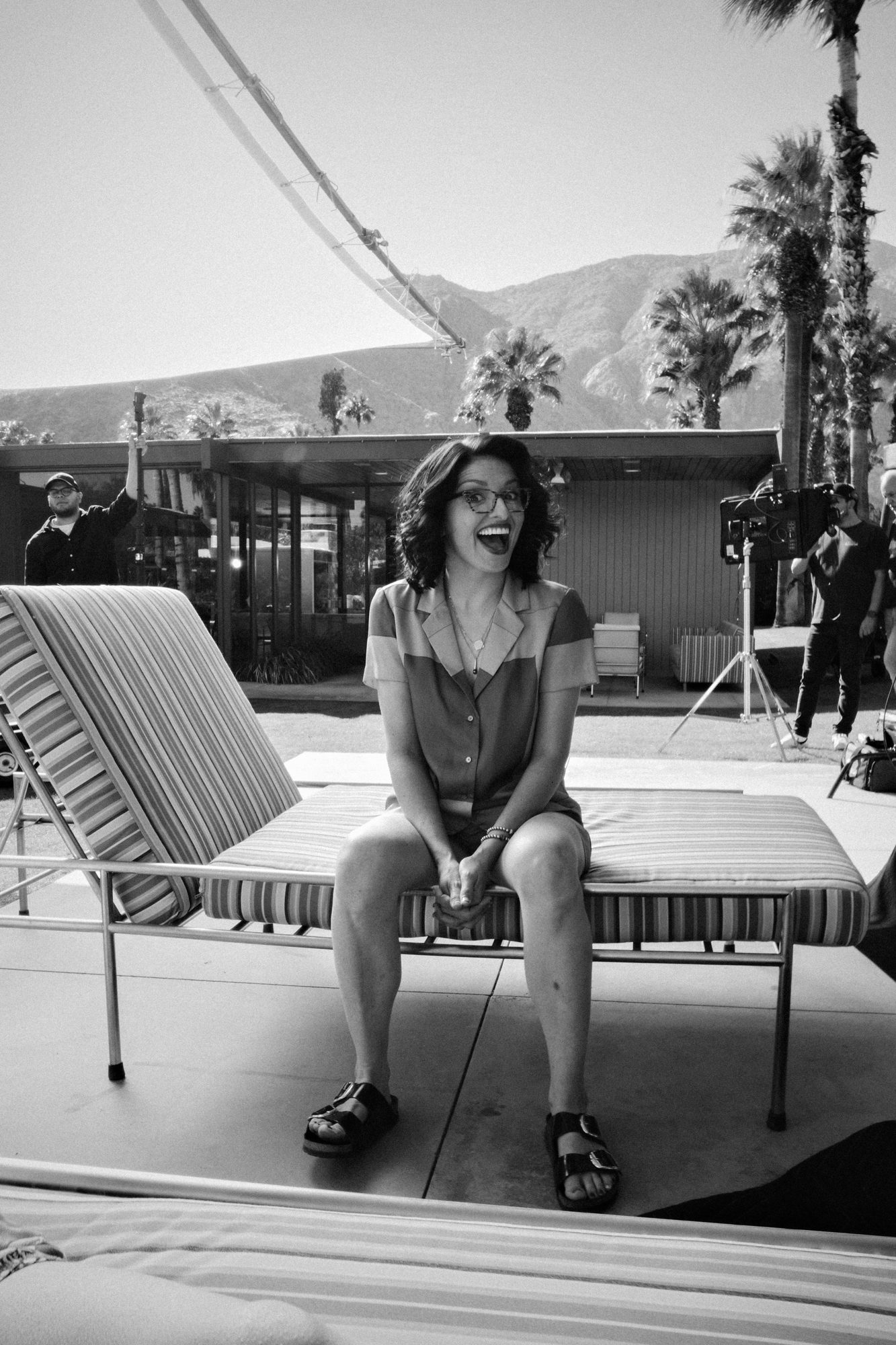 Talent laughing between takes on location